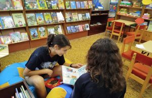 Изложба на български книги в читалищна библиотека в Нови пазар